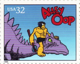 on this U.S. postage stamp, Alley Oop rides on the neck of his purple pet dinosaur, Dinny, wearing a fur loincloth and holding a stone axe