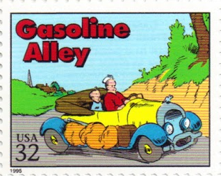 on this U.S. postage stamp, Walt drives with young Skeezix on a country road in an old two-seat convertable car, bags packed on the running board