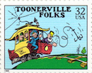 on this U.S. postage stamp, the Skipper, a white-bearded conductor on an electric trolly, throws out an anchor to help pull the trolly up Homan’s Hill