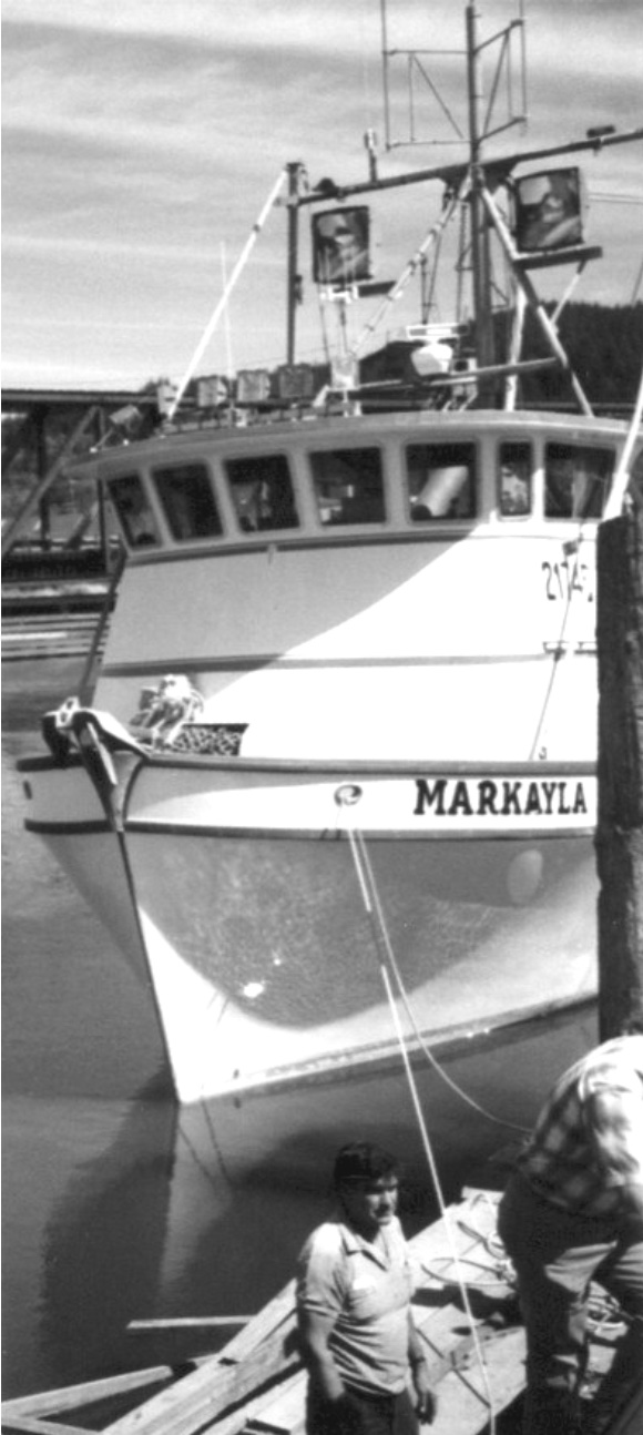 Prow of a large fishing boat at dock
