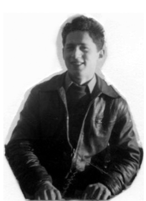 Torso of young man wearing a leather jacket over a sweater