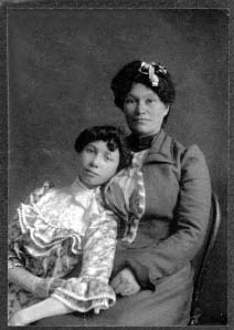Barbara Naumoff-Smith-Bowen-Rohde, on the right, sitting, with her sister Ann Naumoff.