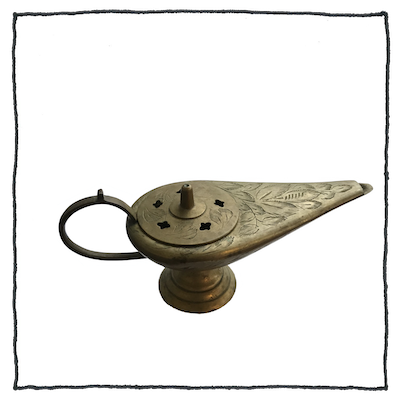 photo of a bronze incense lamp
