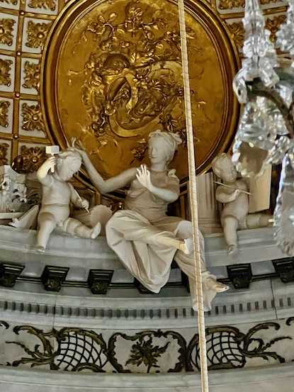 Representation above the wall of the marble hall of a muse teaching sculpture and painting, Sanssouci, Potsdam